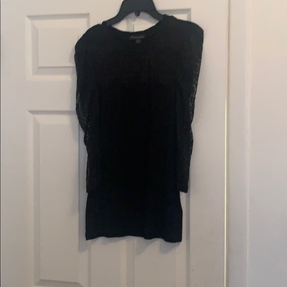 A black shirt with lace arms